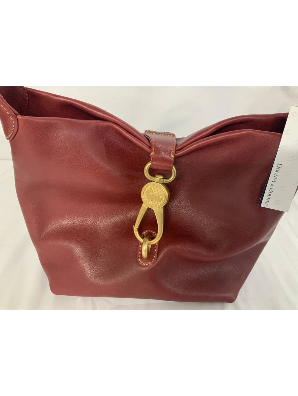 DOONEY AND BOURKE FLORENTINE LEATHER LOGO LOCK HOBO-READ DESCRIPTION